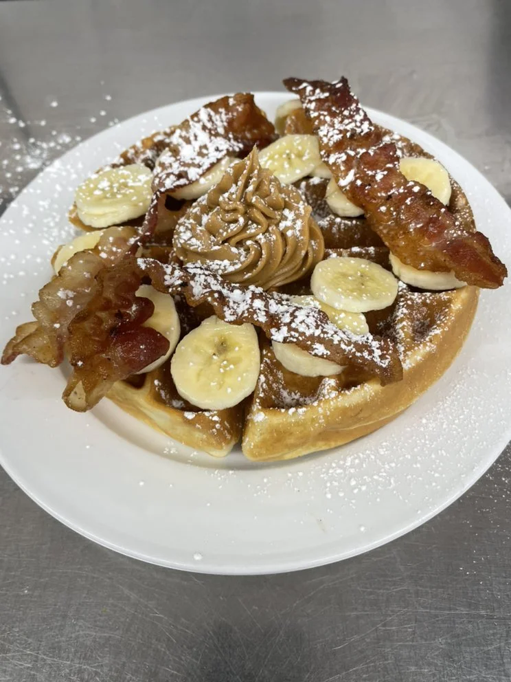 Banana Peanut Butter Bacon - A sweet and savory delight combining crispy bacon, creamy peanut butter, and fresh bananas on fluffy pancakes.